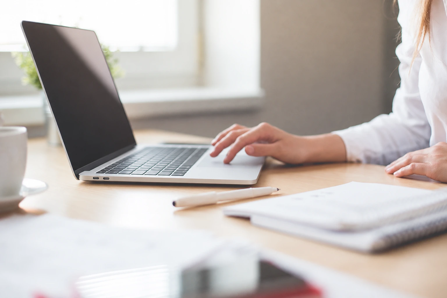 Virtual assistant working online at a laptop